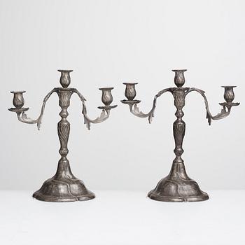 A pair of Swedish Rococo pewter three-light candelabra by Anders Wetterquist, Stockholm 1774.