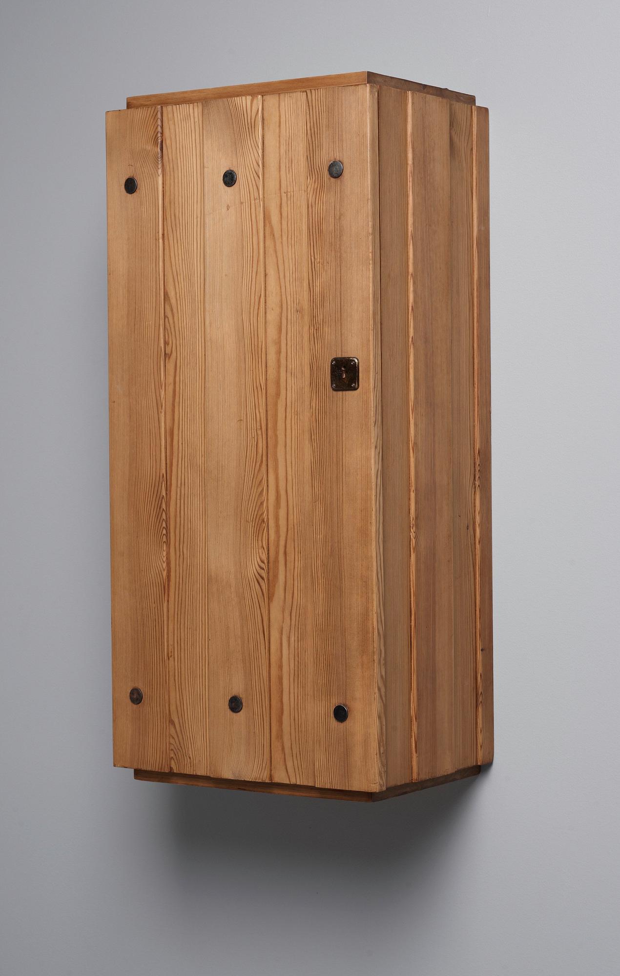 An Axel Einar Hjorth pine wall cabinet, Nordiska Kompaniet, Sweden 1930's.