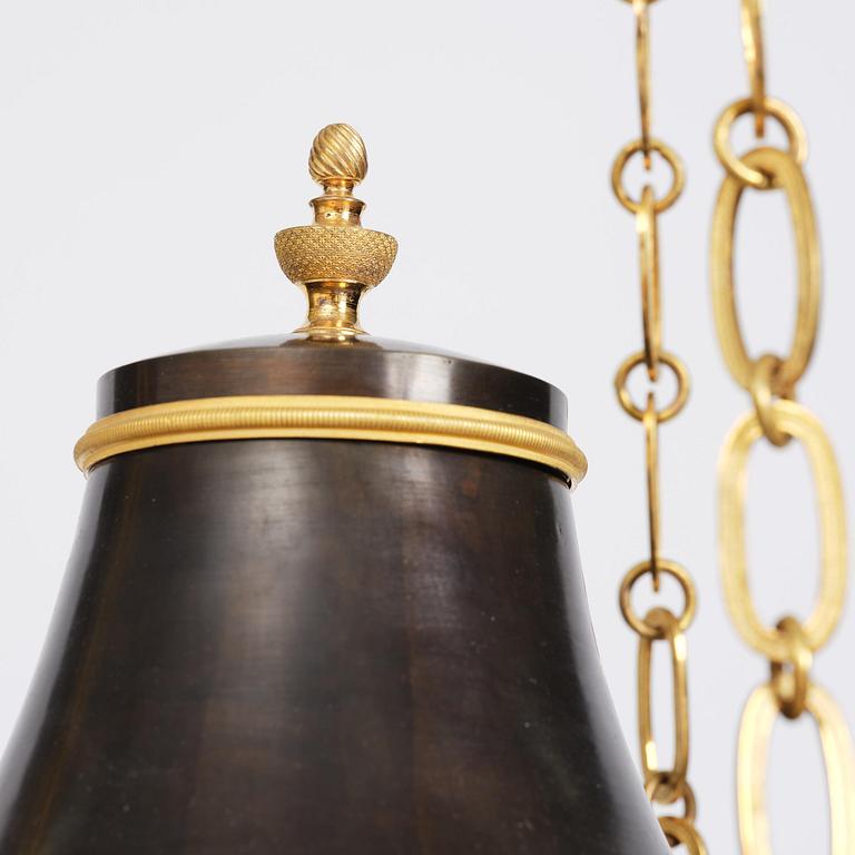 A Swedish Empire ormolu and patinated six-branch chandelier, Stockholm, early 19th century.