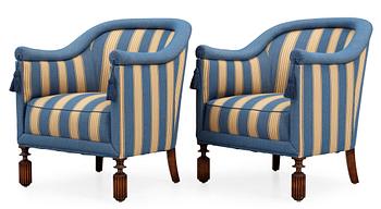 A pair of Axel-Einar Hjorth armchairs 'Library' by NK 1928.
