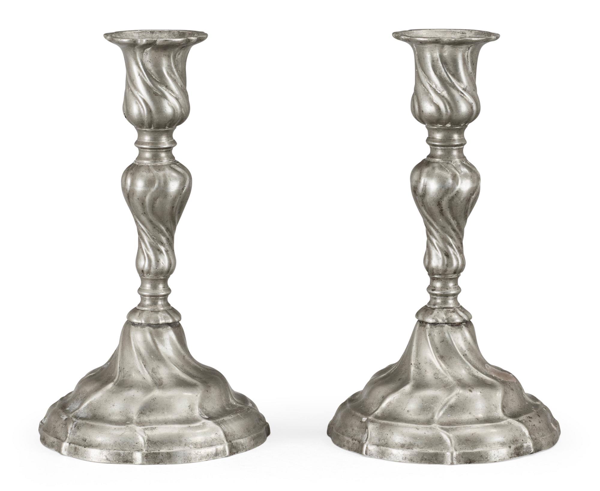 A pair of Rococo pewter candlesticks by Gudmund Östling (1762-1790).