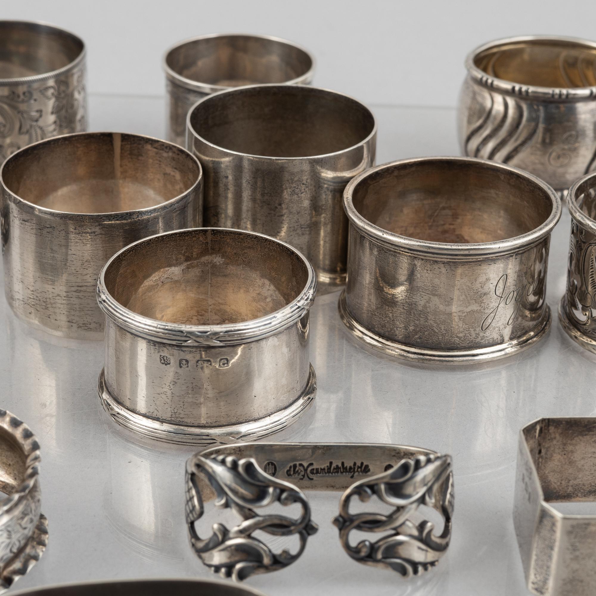 A collection of silver napkin rings, mostly England, Denmark (46 pieces).