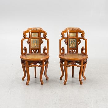 919. A pair of hardwood chairs,  Qing dynasty, 19th Century. Seal mark to reverse of back.