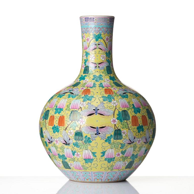 A large Chinese famille rose yellow ground vase, 20th Century with Qianlong mark.