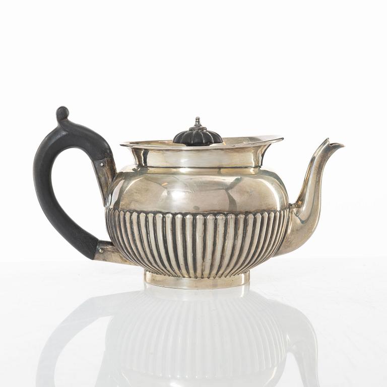 An English silver teapot, mark of Richard Pearce & George Burrows, London 1834.