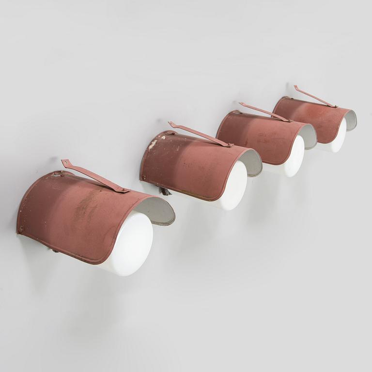 Paavo Tynell, A set of four model 7307 wall lamps / outdoor lighting for Idman. Mid-20th century.