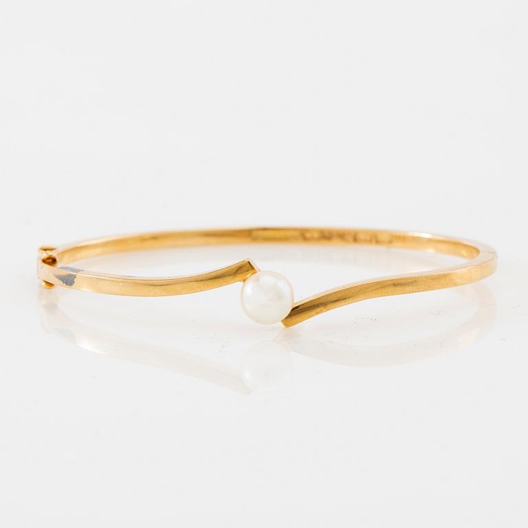 Armring, 18K guld och pärla, Stigbert, Stockholm, 1964.