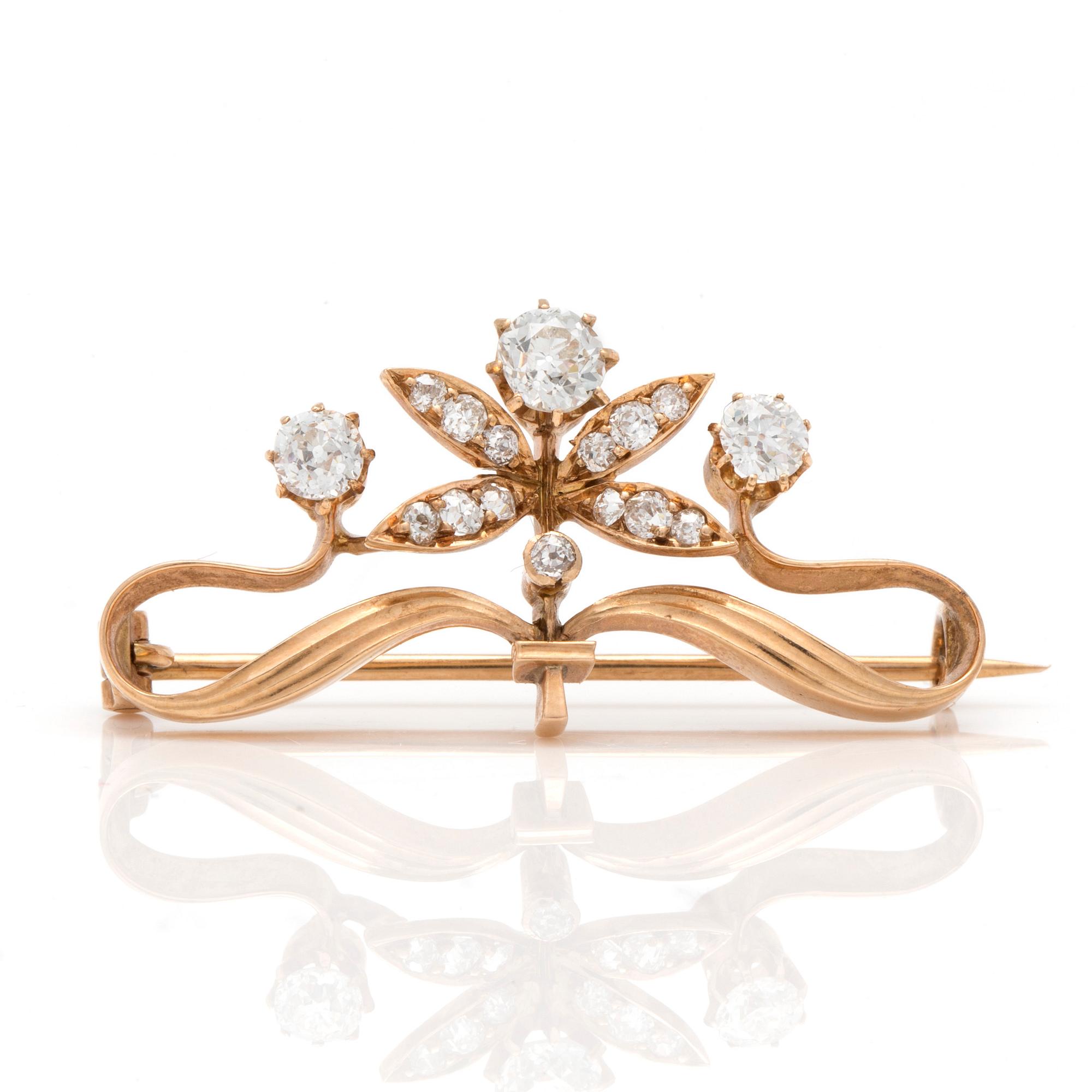 A brooch with rose and old-cut diamonds.