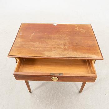 An Empire style mahogany table first half of the 20th century.