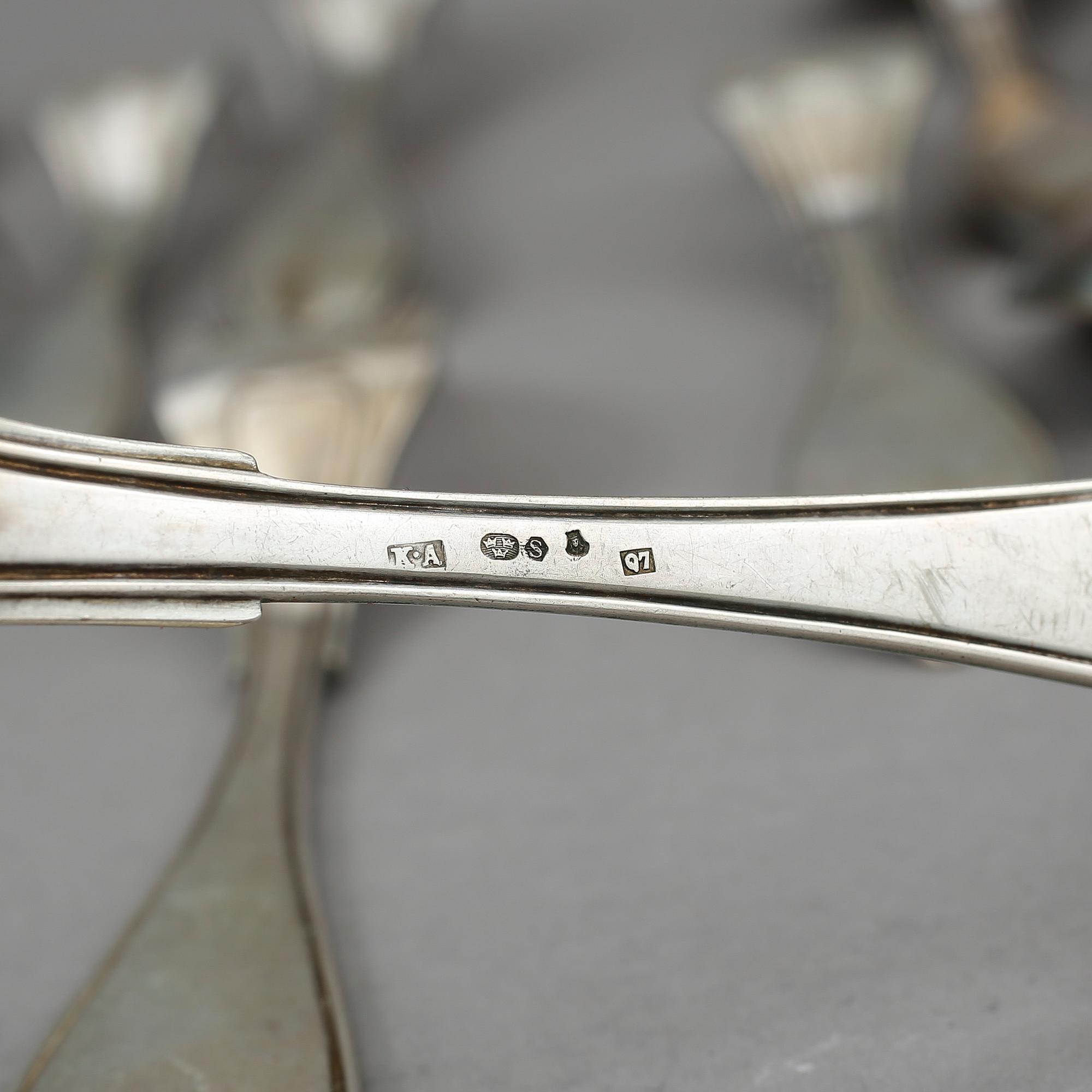 PARTI BESTICK, 15 delar, "Svensk spets" och "Vasa", bla K Andersson, Stockholm, 1918. Vikt ca 883g.