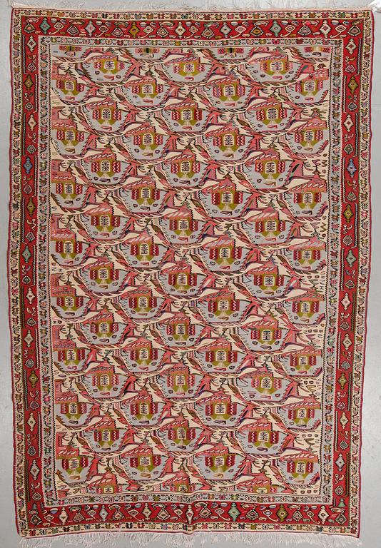 A carpet, an old kilim, probably Senneh, ca 292,5 x 193-202 cm.