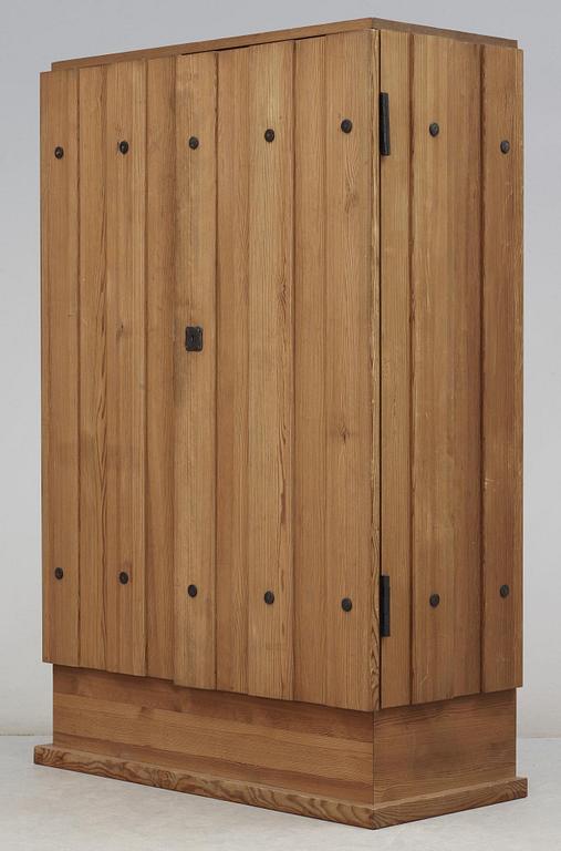 An Axel Einar Hjorth stained pine cabinet, 'Lovö' Nordiska Kompaniet (NK), 1930's.