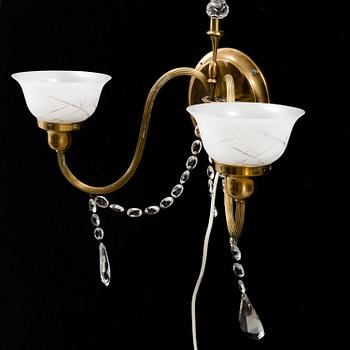 A 20th century brass wall lamp.