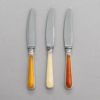 A set of twelve Tillander knives, enamel and silver (.916), Helsinki, Finland 1968. Danish steel blades.