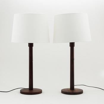 Uno & Östen Kristiansson, a pair of rosewood table lights, Luxus, Vittsjö, 1960's.