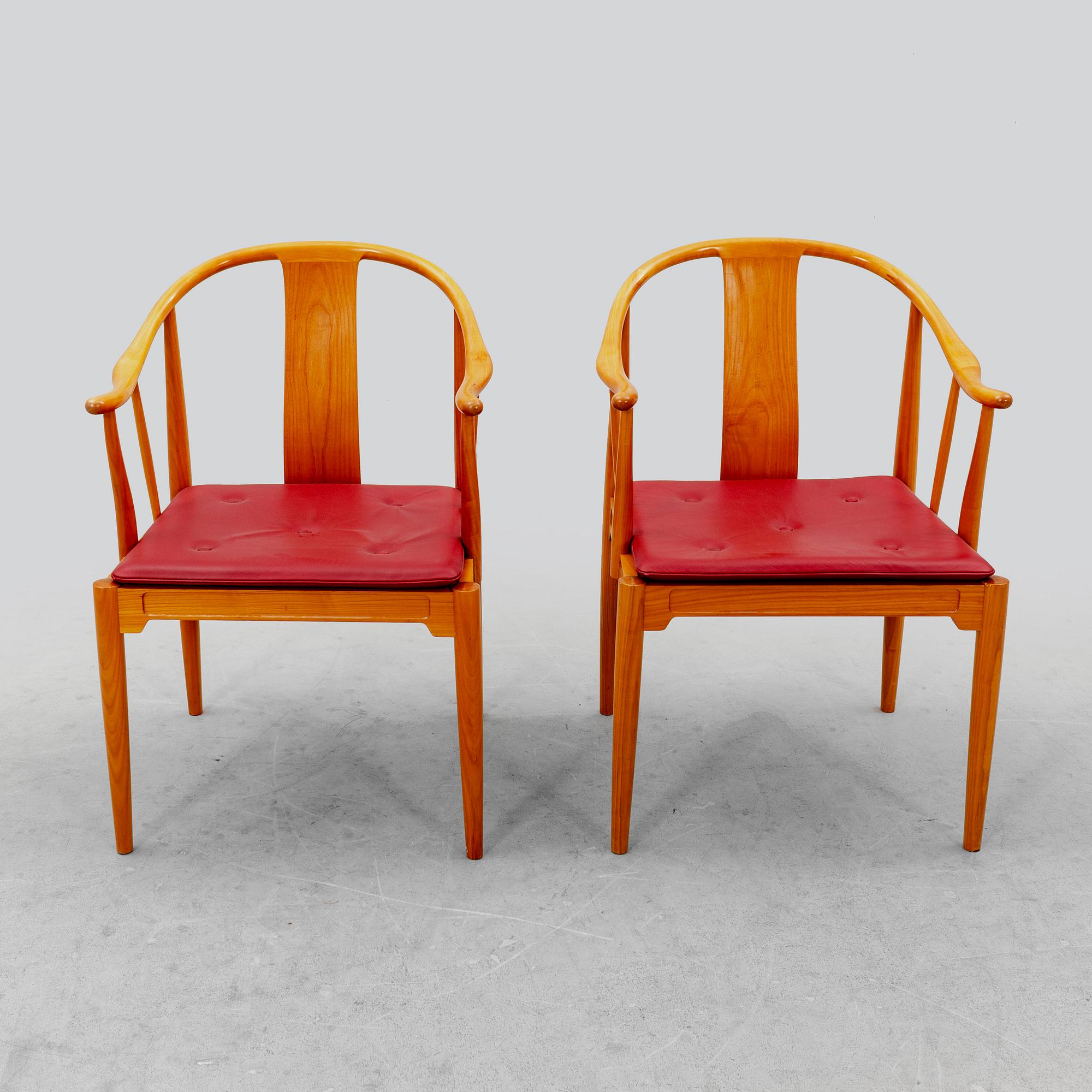 Hans J Wegner, a pair of "China" chairs for Fritz Hansen, Denmark, dated 1994.