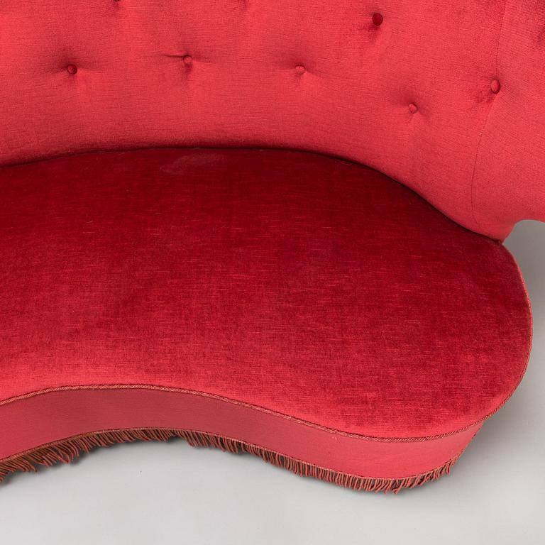 A mid-20th -century sofa and armchair.