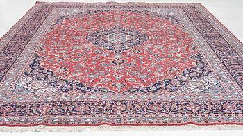 An Old Keshan carpet, approx. 400 x 299 cm.