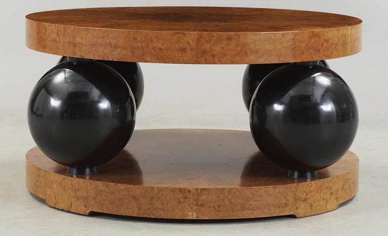 An Erik Johansson burr wood and blacquered sofa table,
Reiners Möbelfabrik, Sweden 1941.