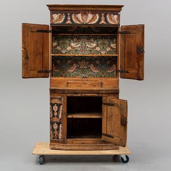 A traditional painted swedish cabinet dated 1744.