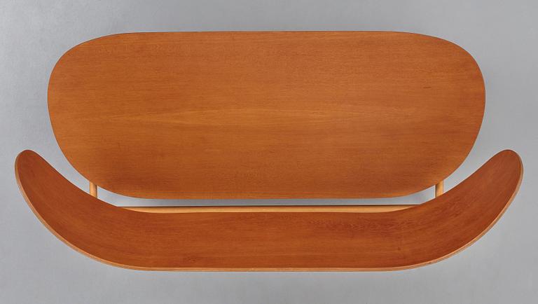 A HANS J WEGNER, a  "Shell set/ Skalsæt" comprising a sofa, a chair and a table, Fritz Hansen, Denmark 1950's.