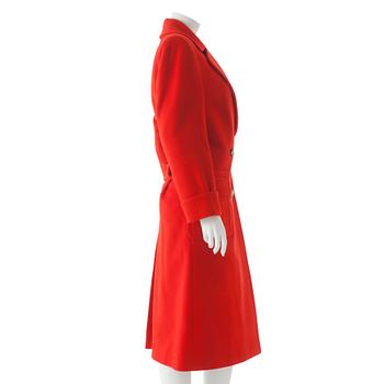 CÉLINE, a red cashmere and wool coat.