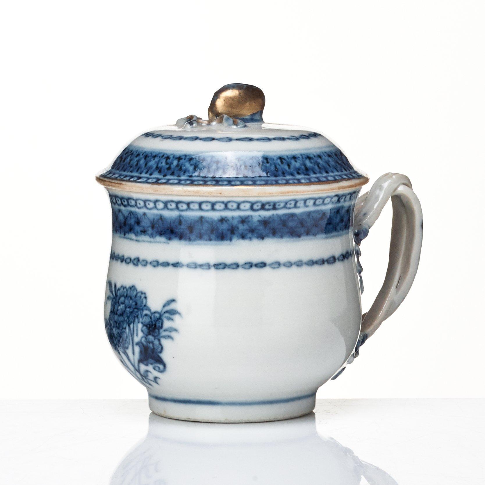 A set with a blue and white tray and 12 custard cups with stands, Qing dynasty, Qianlong (1736-95).