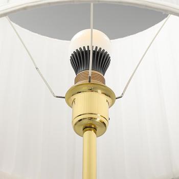 A brass and leather floor lamp from Örsjö Industri, 21st century.