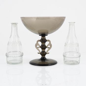 Simon Gate, a 'Vingarna' glass bowl for Sandvik, around 1920. A pair of glass carafes, 19th century.