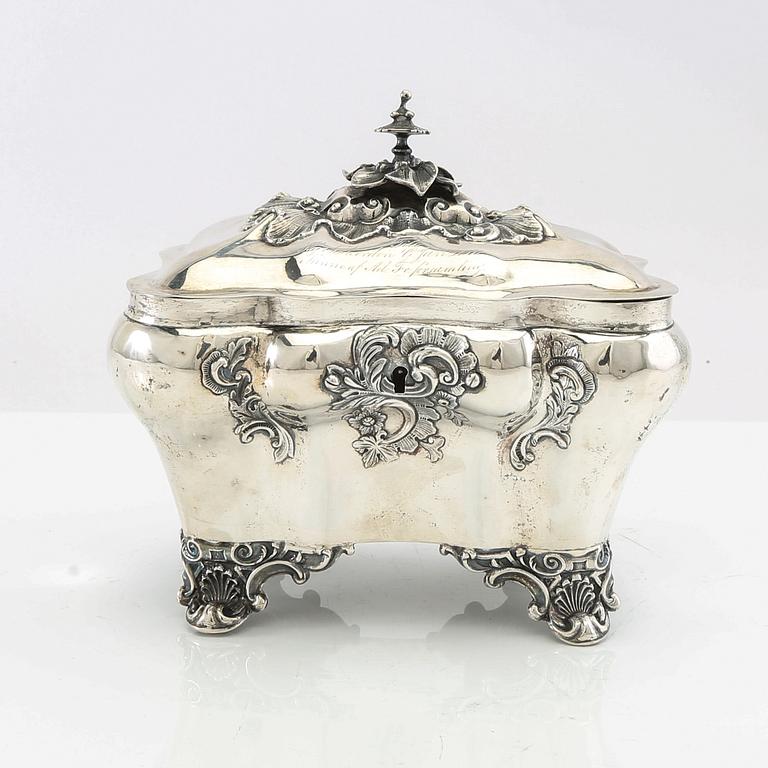 Christian Hammer sugar box with key, silver, Stockholm 1858, Neo-Rococo.