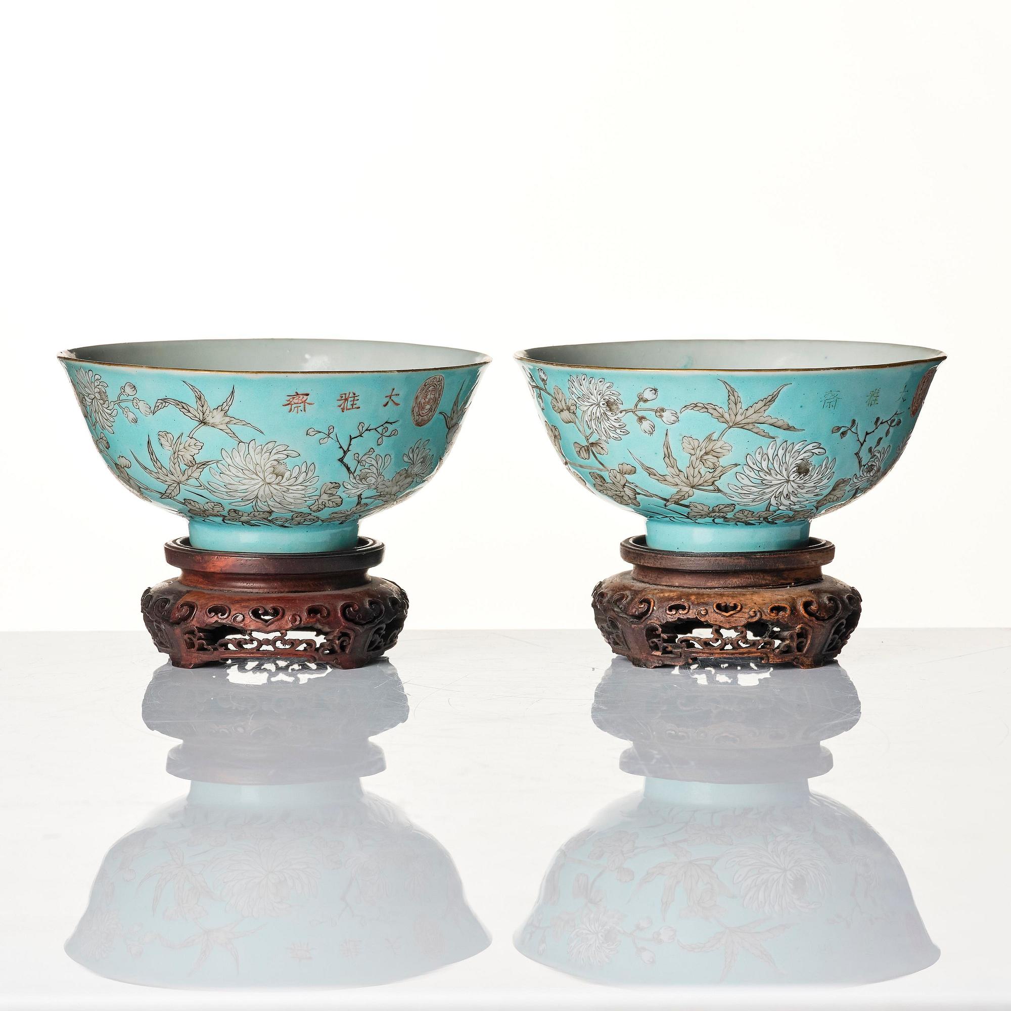 A pair of turquoise ground 'baijiaxiang' cups, Qing dynasty with seal mark in red.