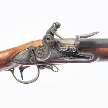 Flintlock gun, converted from a percussion lock.