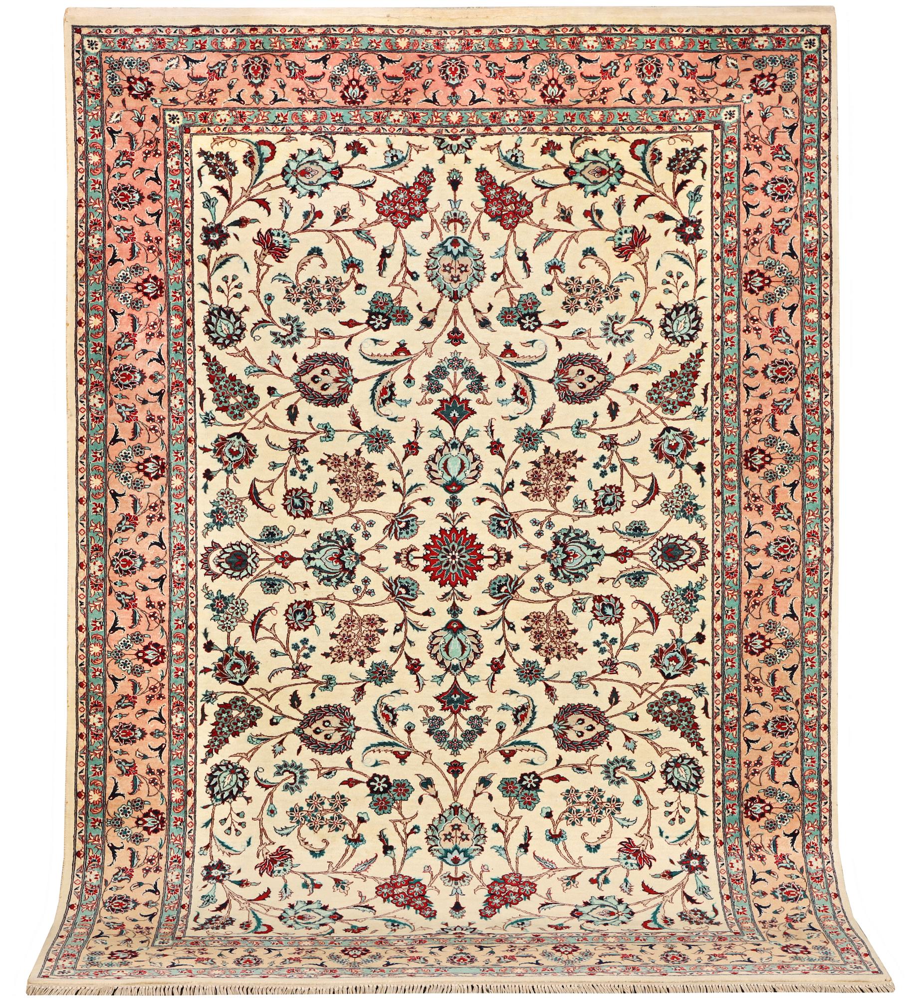 An oriental silk carpet, a. 280 x 185 cm.
