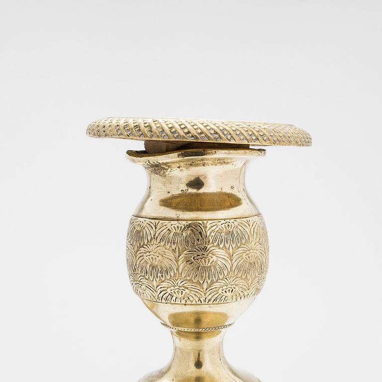 A pair of early 19th century French gilded Empire candlesticks.