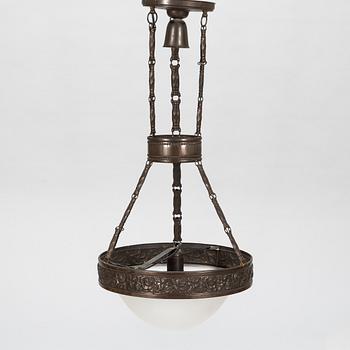 An early 20th century Jugend style ceiling lamp.