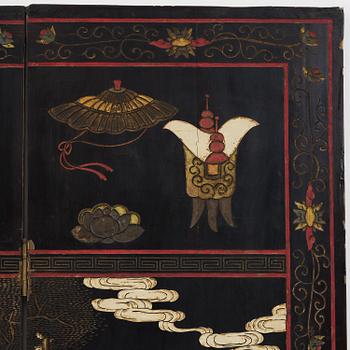 A Chinese four panel lacquer folding screen, first part of the 20th century.