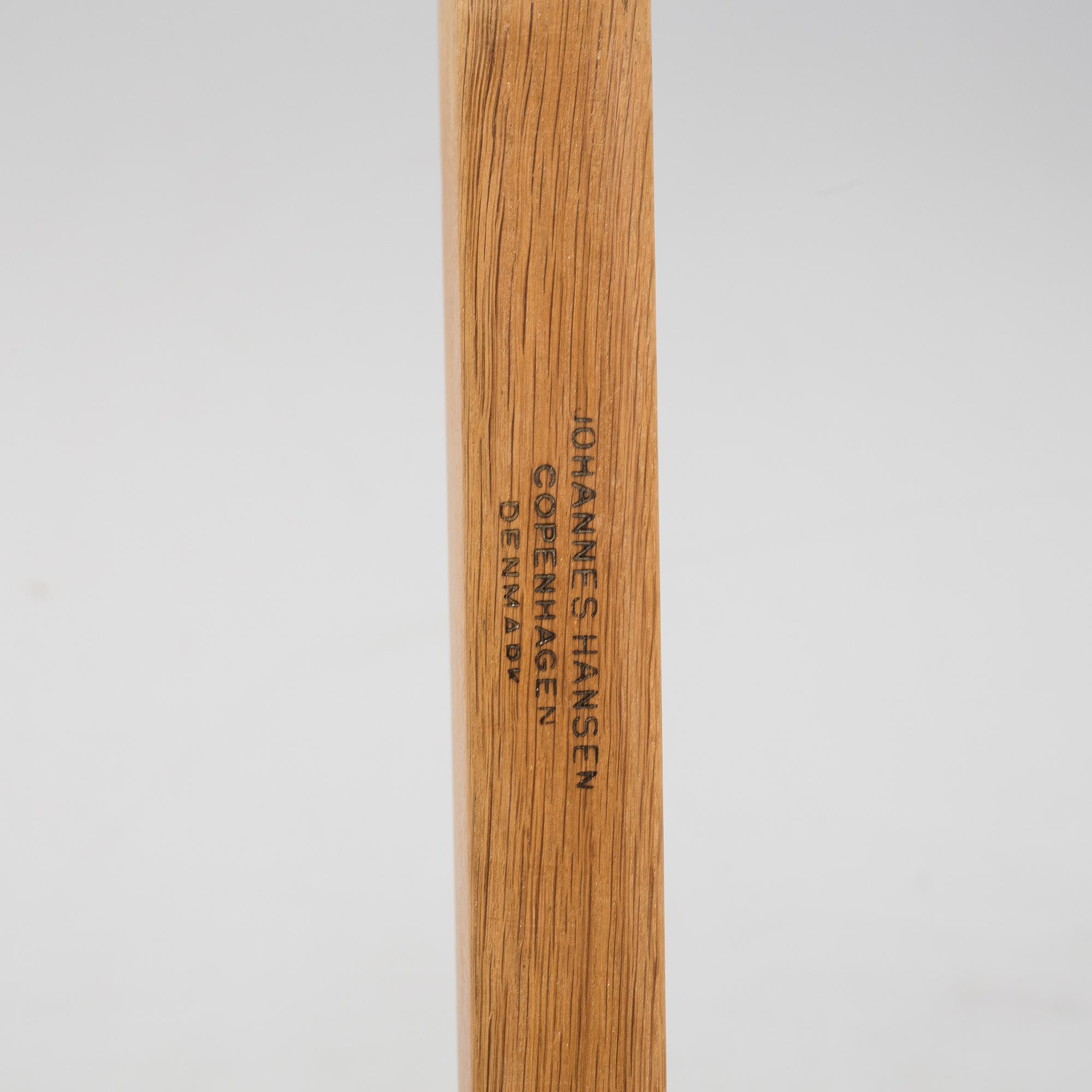 A model JH 575 coffee table by Hans J Wegner for Johannes Hansen.