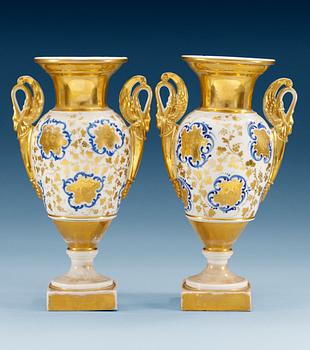 A pair of French Empire vases.