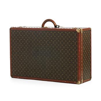 510. LOUIS VUITTON, a monogram canvas suitcase.