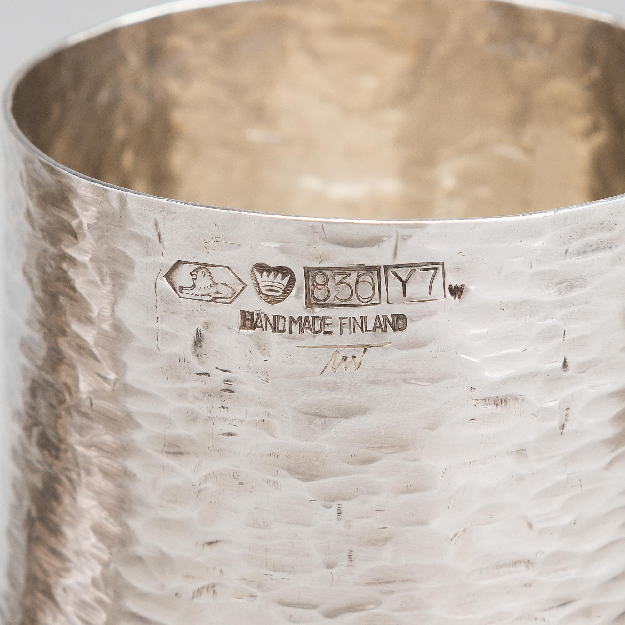 TAPIO WIRKKALA, A set of three silver beakers, marked TW, Kultakeskus, Hämeenlinna, Finland 1976.