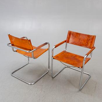 4 late 20th century Italian armchairs.