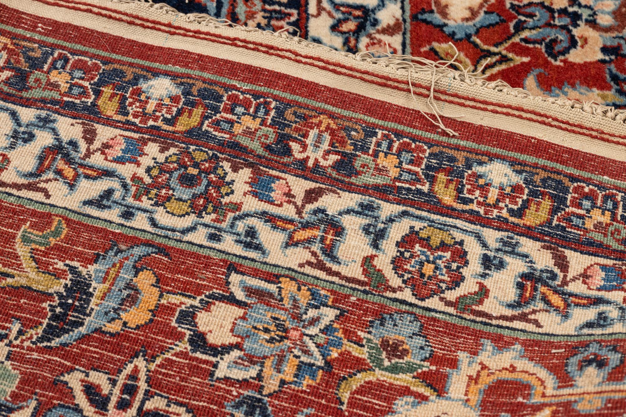 A carpet, semi-antique Esfahan, ca 336 x 212 cm.