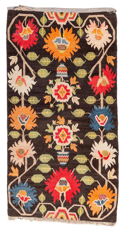 An antique Tibetan rug, Qing dynasty, circa 1900. Measure 173 x90 cm.