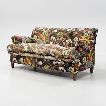 A model 703 sofa by Josef Frank for Firma Svenskt Tenn.