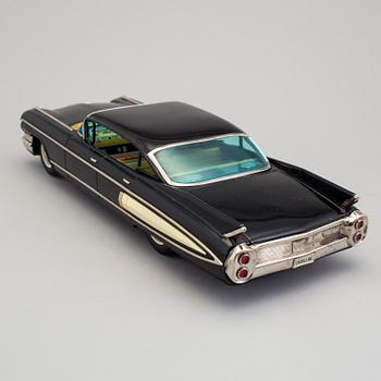 A tinplate Cadillac by Yonezwa, Japan. Ca 1960.