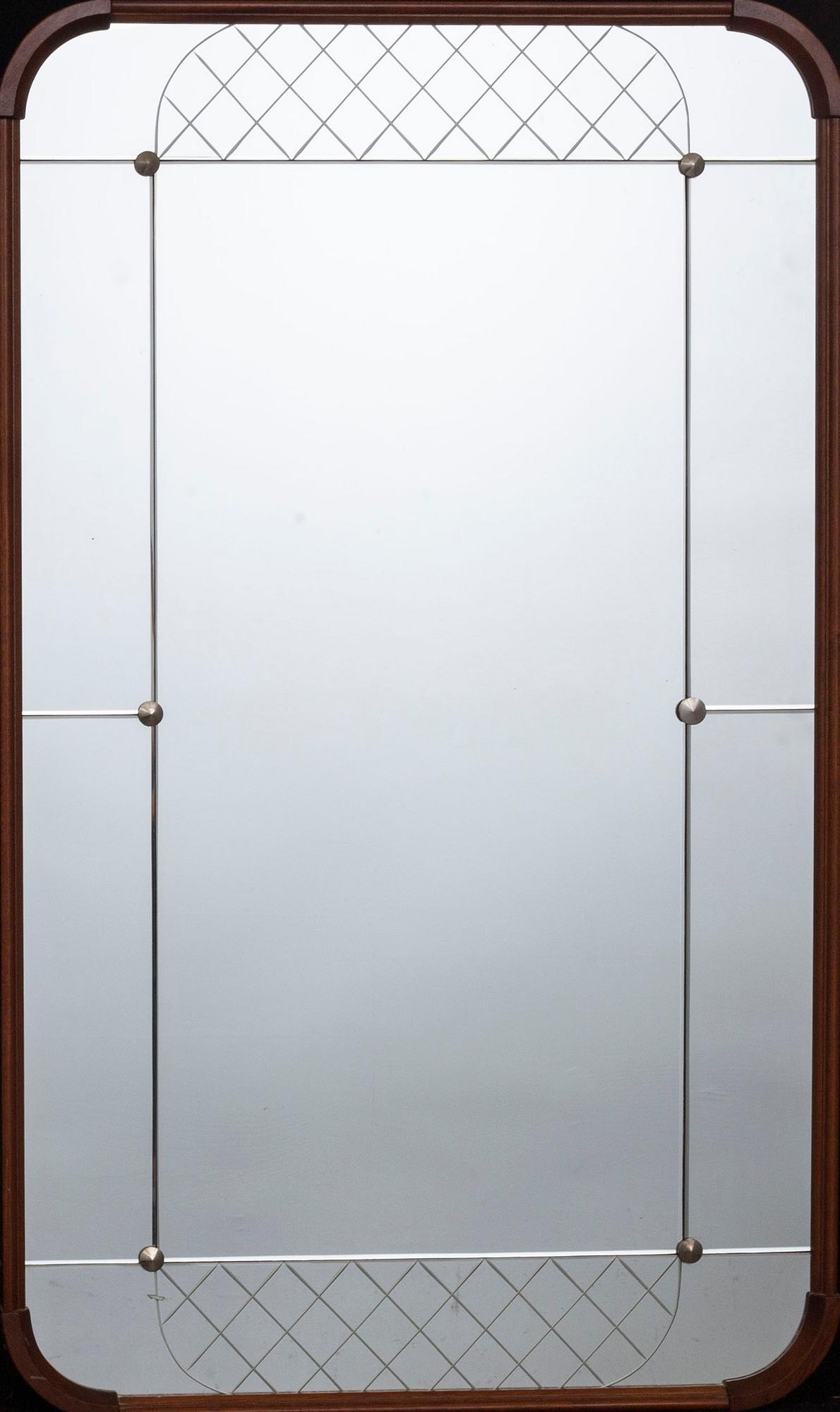 A mahogany mirror from Glas&Trä, Hovmantorp.