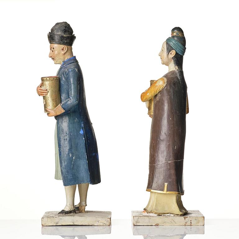 A pair of Chinoiserie figures of a Parsi tradesman and his wife, Qing dynasty, Canton, 19th century.
