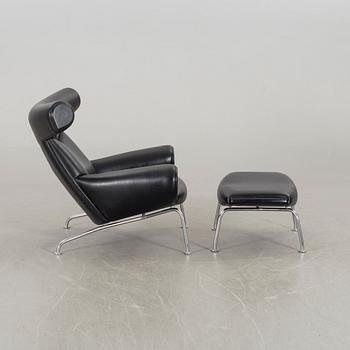 HANS J WEGNER, "Ox chair" lounge chair and stool.