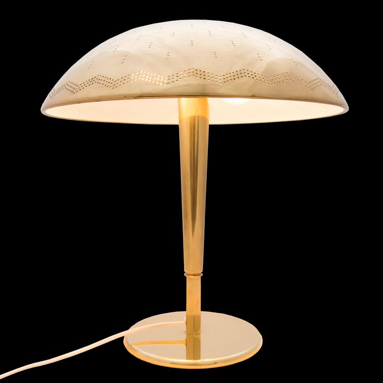 A mid-20th century table lamp model 5061 for Idman Finland.