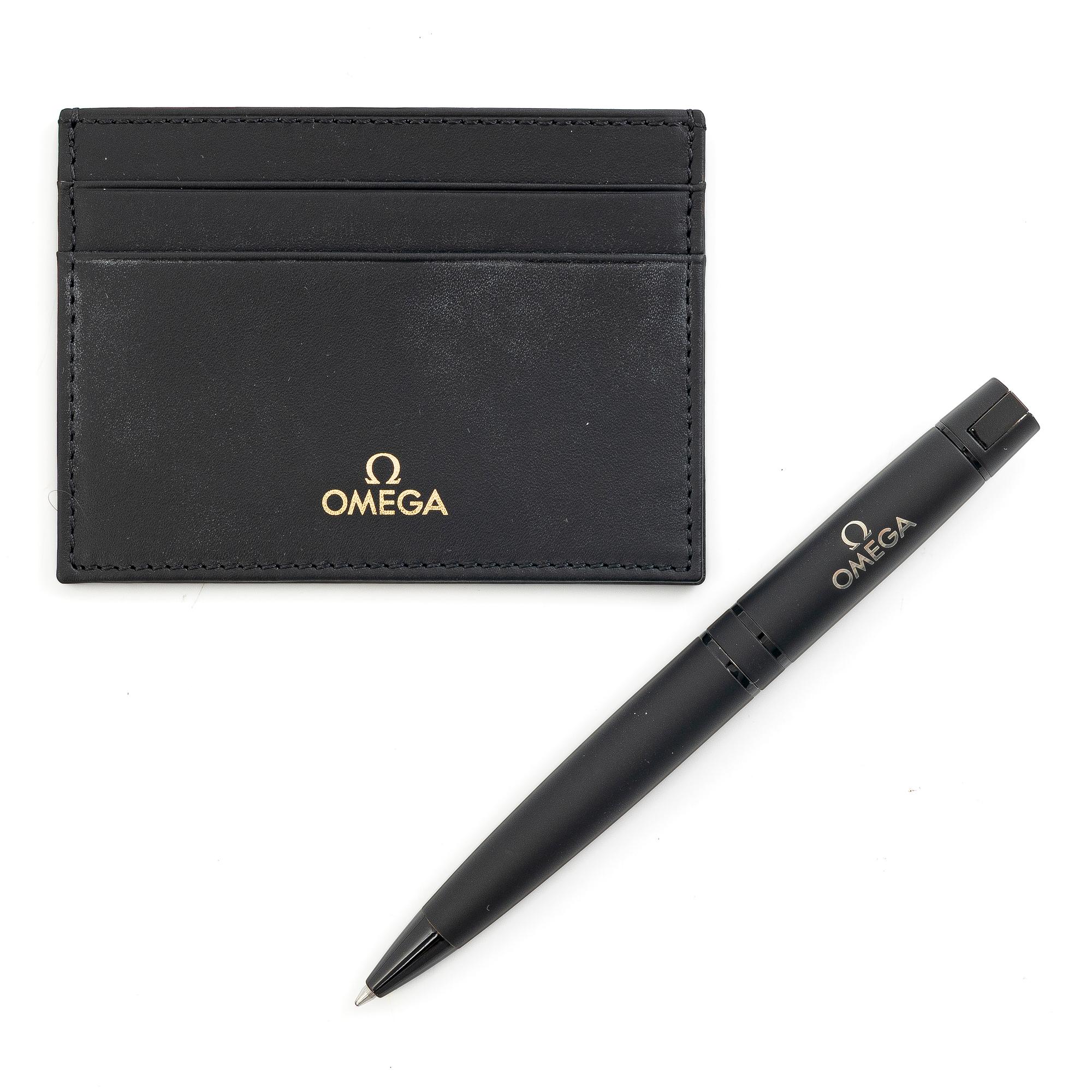 Omega, card holder & pen, “No Reserve”.